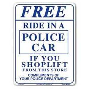 SIGN RIDE IN A POLICE CAR     